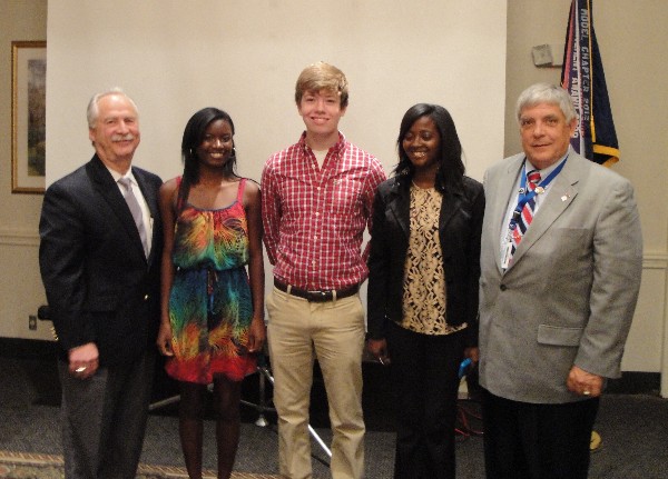 Scholarship winners and board members gathering in July are (l-r) Michael Schexnayder, Oluwatobi Ojewole, Patrick Monroe, Bridgette Howard and Budura.